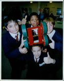 Headington Middle School's Adam Owen and Craig Mason with their model racing car Shunts, made from rubbish, alongside Temple Cowley School's Waseem Butt, Nathaniel Bertram, William Trinder, and Johnny Simpson. - Vintage Photograph