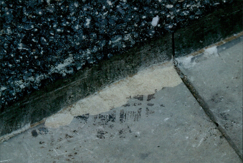 A section of Magdalen Street West in Oxford is damaged. - Vintage Photograph