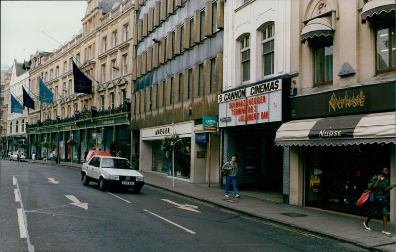 Police officers investigate a crime scene on Magdalen Street in Oxford. - Vintage Photograph