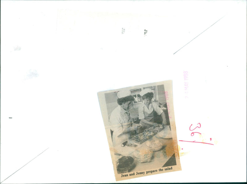 Jean and Jenny prepare a salad in the kitchen. - Vintage Photograph