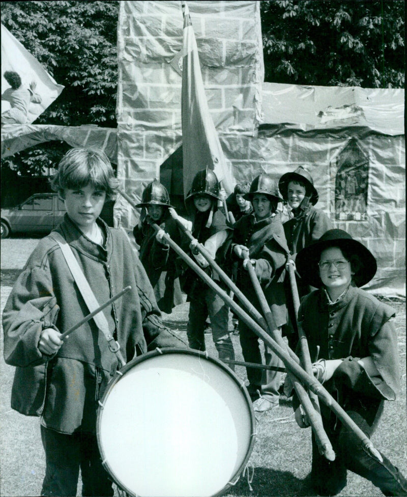 Pupils from St John Bosco Middle School in Oxford, UK, reenact a scene from the English Civil War. - Vintage Photograph