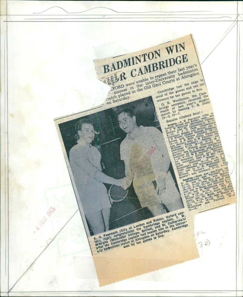 Cambridge captain T. W. Mairyne (Methodist College, Belfast, and St. Catharine's) congratulates Oxford captain A. H. Pearmain (City of London and Keble) after winning the Inter-University badminton match at Abingdon on Saturday. - Vintage Photograph