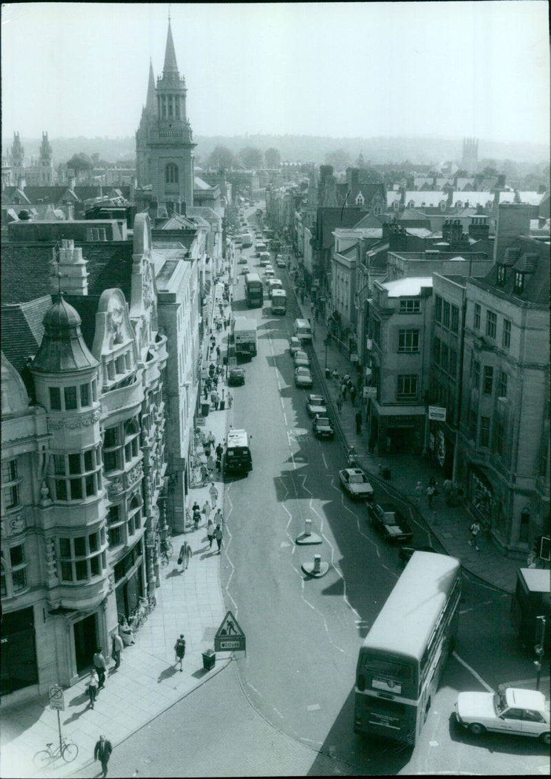 People walking along High Street in Oxford, England. - Vintage Photograph