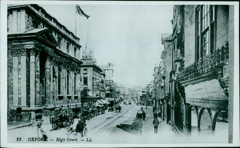 A crowd of people gathered on Oxford's High Street. - Vintage Photograph