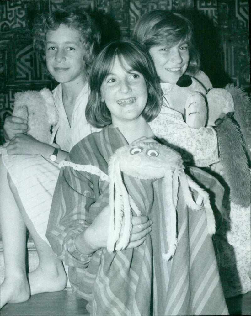 Three Headington School students model their own designs in a special fashion show to mark the school's Foundation Day. - Vintage Photograph