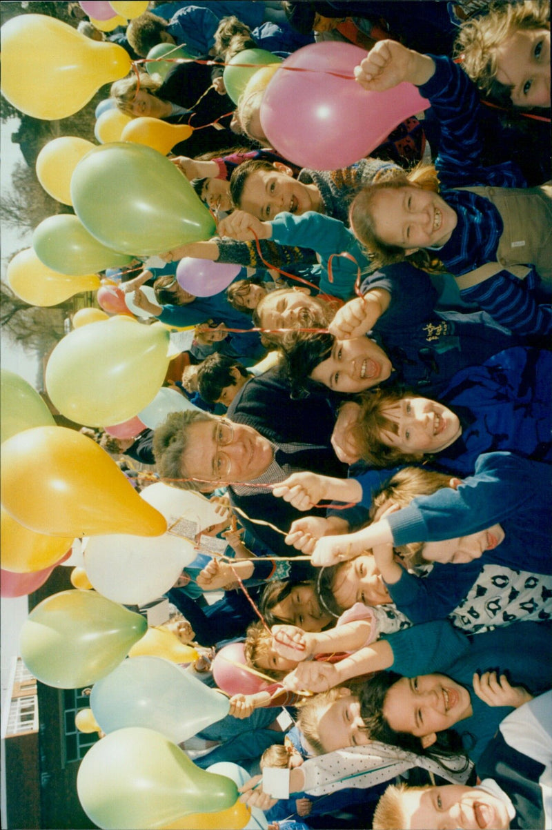 Children and Headmaster Mr. Ken Withers releasing balloons to start Maths Week at Cutteslowe First School. - Vintage Photograph