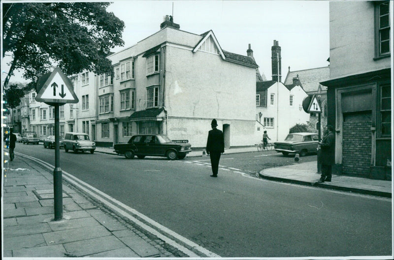 Traffic is diverted to a compulsory left turn on Holywell Street, Oxford. - Vintage Photograph