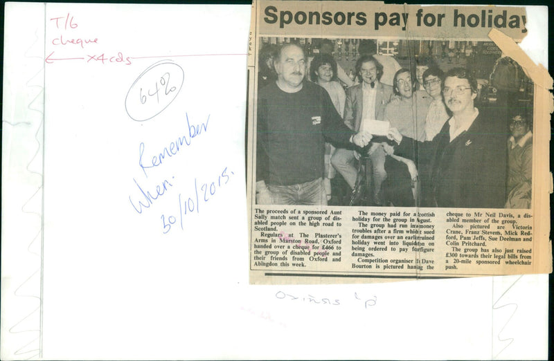 Dave Bourton presents a cheque to Neil Davis to help send a group of disabled people on a holiday to Scotland. - Vintage Photograph