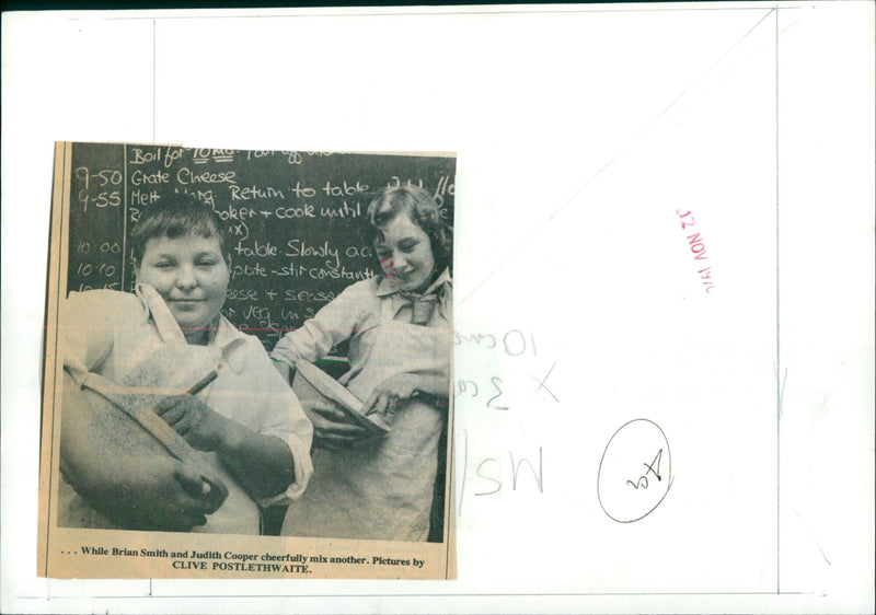 Brian Smith and Judith Cooper making a meal together. - Vintage Photograph