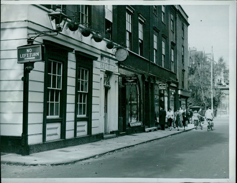 An empty restaurant and tent shop on Ox Street. - Vintage Photograph