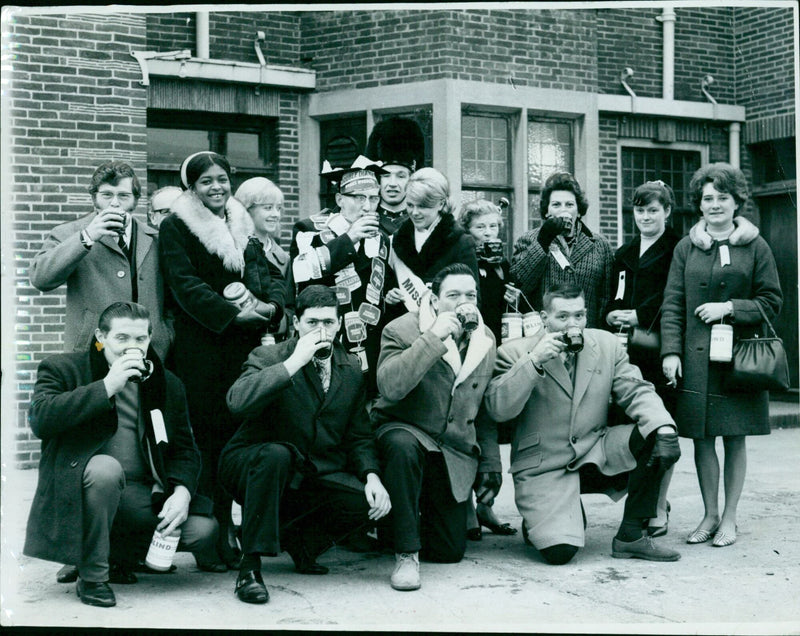 Contestants and supporters of a beer marathon at their first port of call. - Vintage Photograph