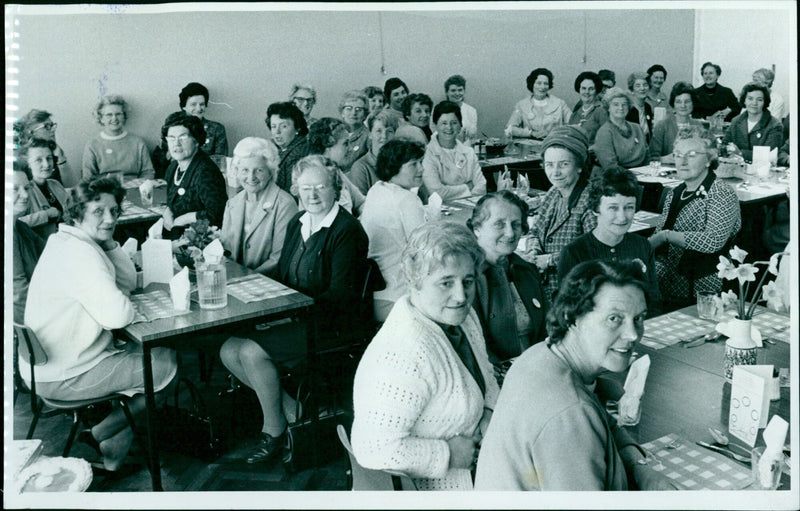 Sixty Oxford school meals supervisors and cooks enjoy a school lunch during their one-day conference at Redefield School. - Vintage Photograph