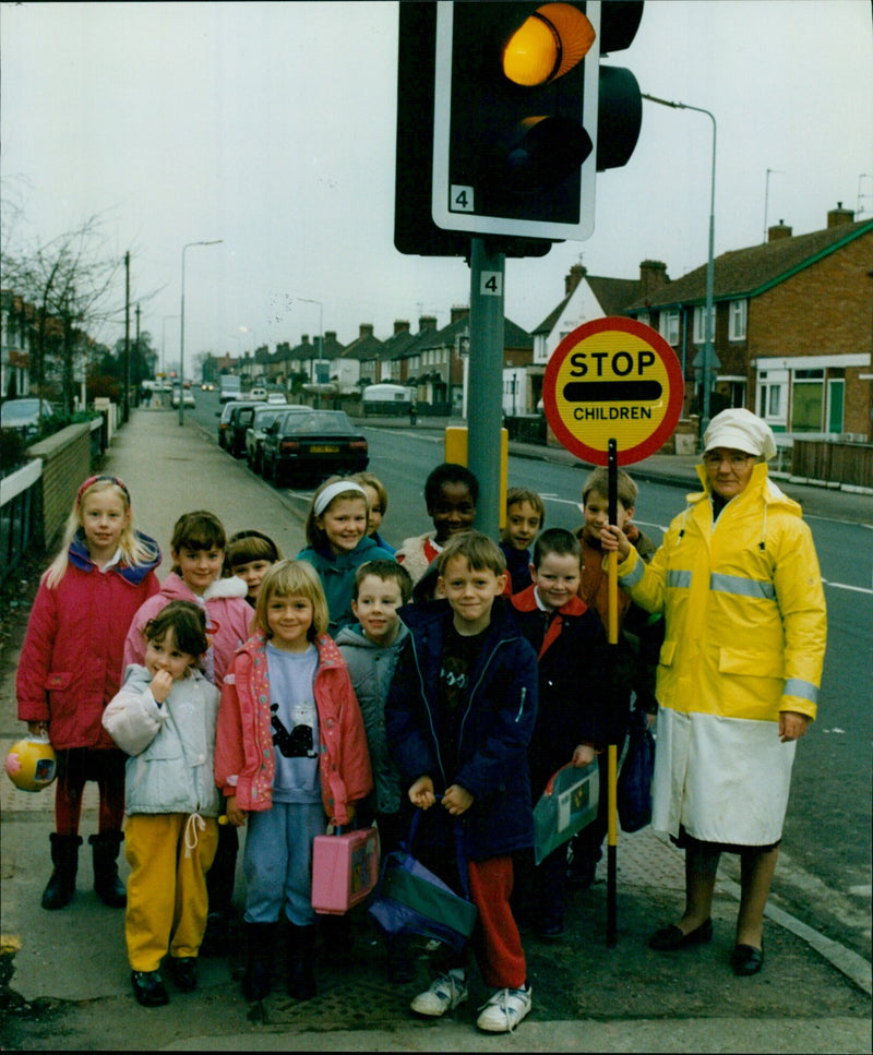 Mrs. Joyce Bellinger, a lollipop lady, retires from St. Francis First School in Oxford. - Vintage Photograph