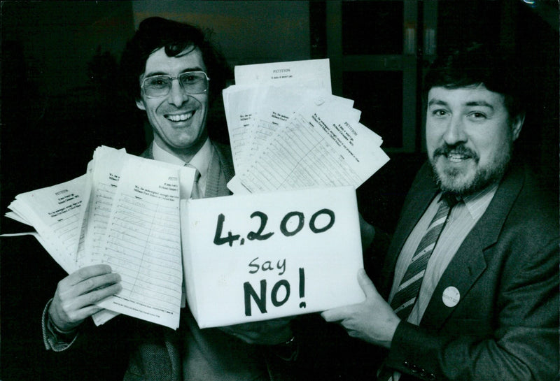 Millhamford and Oxford Schools petitioners celebrate after collecting over 4,200 signatures to save their schools. - Vintage Photograph