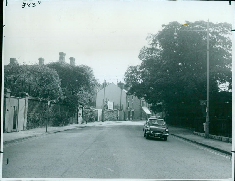 Oxford residents waiting at bus stop 63. - Vintage Photograph