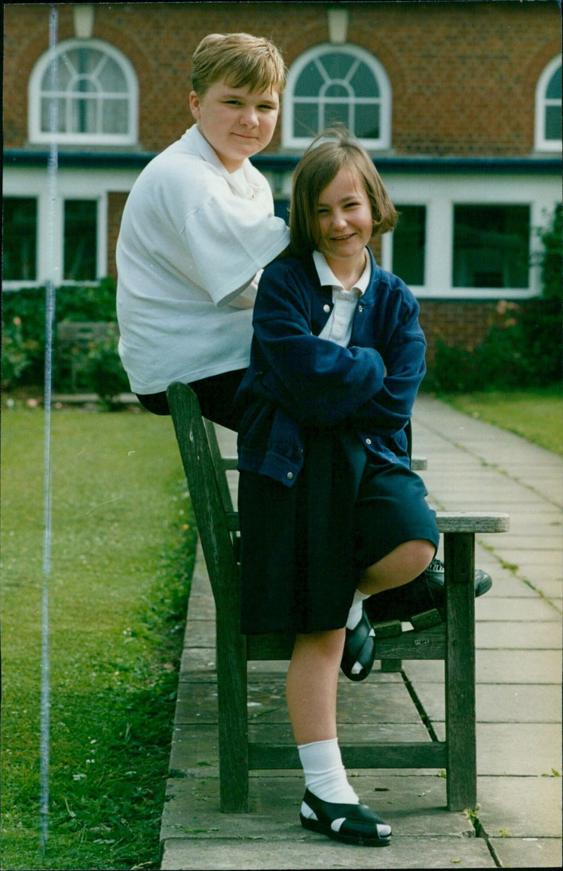 Students Amanda Warrick and Rachel Fitchener work together on a project at Temple Cowley School in Oxford, England. - Vintage Photograph