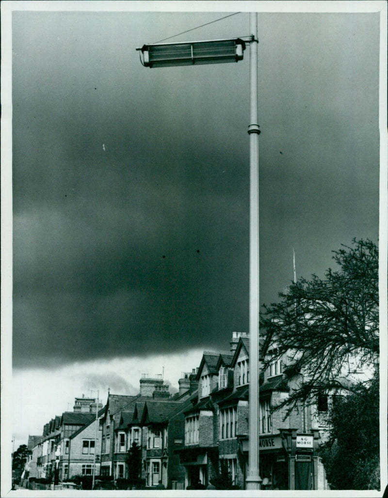 Tuka Morse standing in front of a house in May 1957. - Vintage Photograph