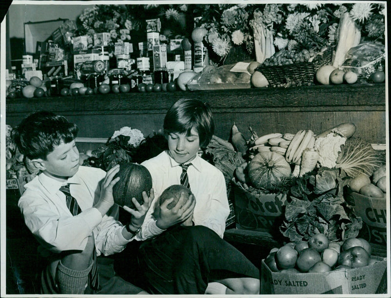 Ann Duhig and Peter Jackson proudly display the harvest festival produce from Botley County Primary School. - Vintage Photograph