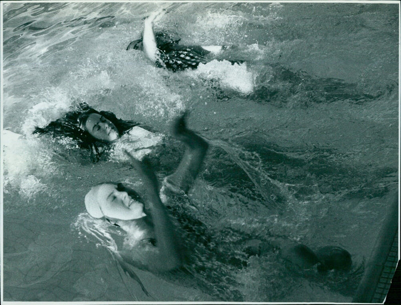 Women swimmers training in a pool. - Vintage Photograph