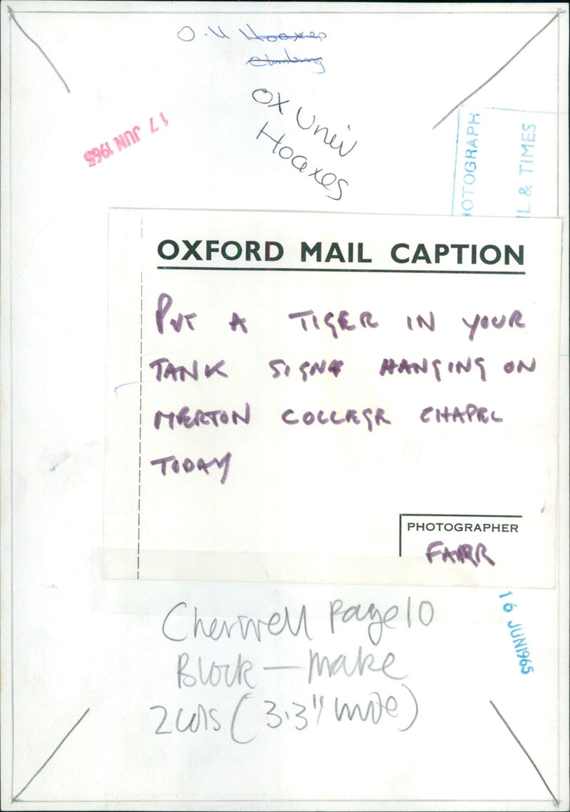 Students from Oxford University hang a sign reading "Put a Tiger in Your Tank" on Merton College Chapel. - Vintage Photograph