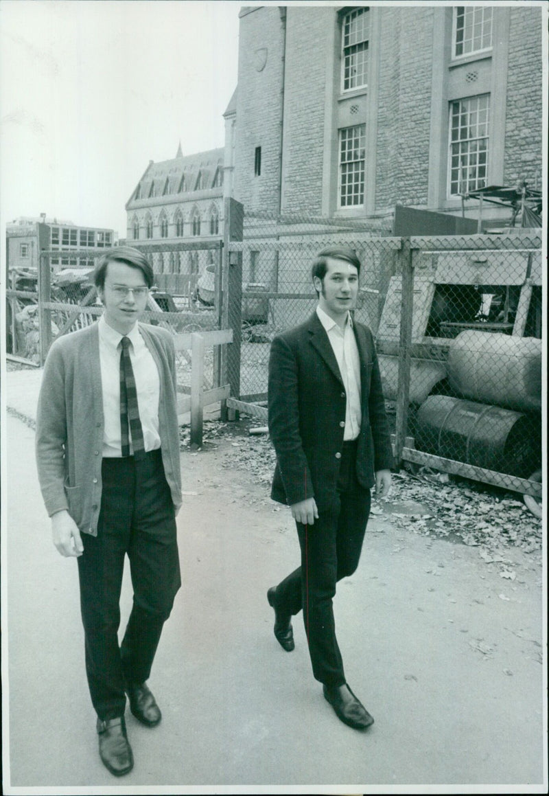 Two students save books from blaze in Oxford Fire Brigade rescue. - Vintage Photograph