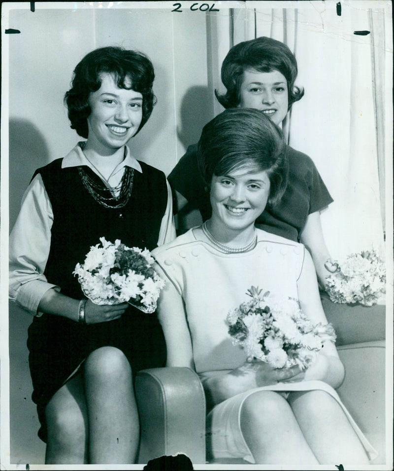 Three telephone operators from the Oxford region pose after winning a singing contest. - Vintage Photograph