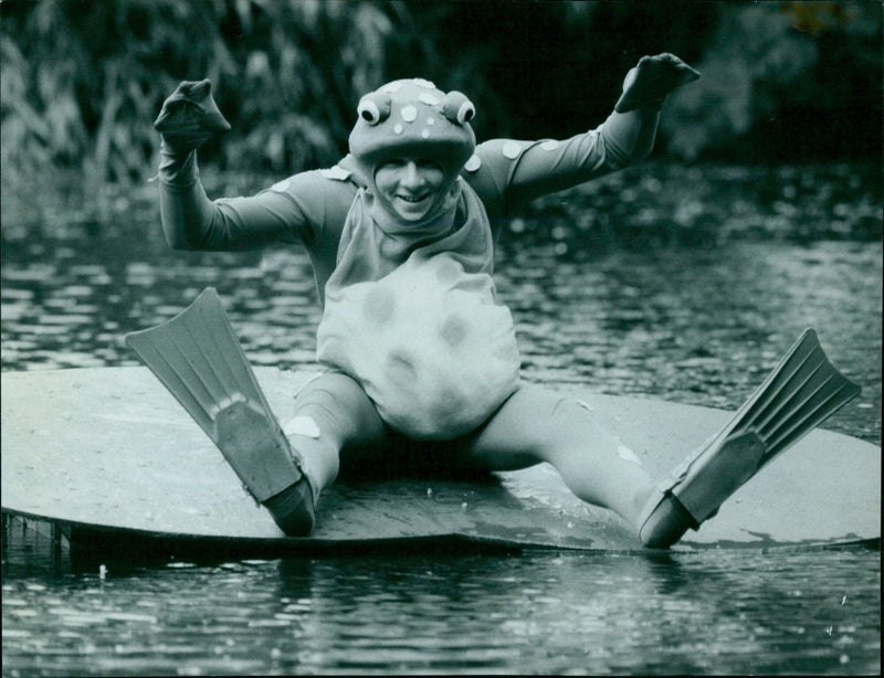 Students at Worcester College enjoy a lily pad on the college lake. - Vintage Photograph