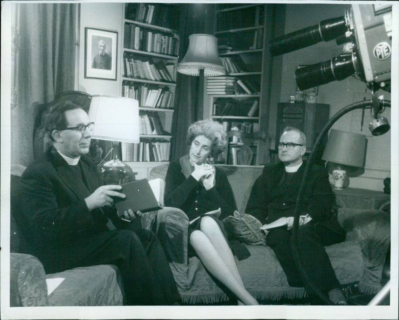 Father Agnellus Andrew, Lady Eldon, and Father M. O' Dwyer are filmed in the Old Palace, Rose Place for a documentary on Cardinal Newman. - Vintage Photograph