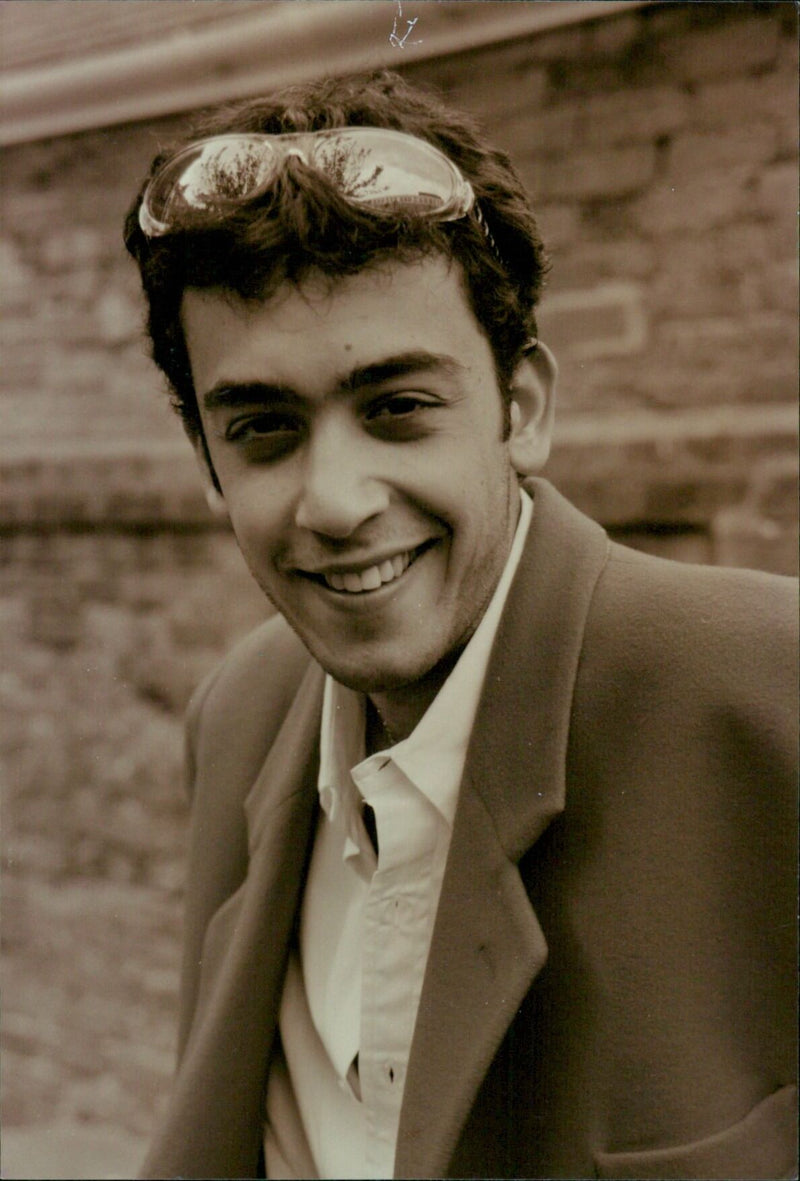 Ramha Toly, a student from Ben Juan, poses for a press photograph. - Vintage Photograph