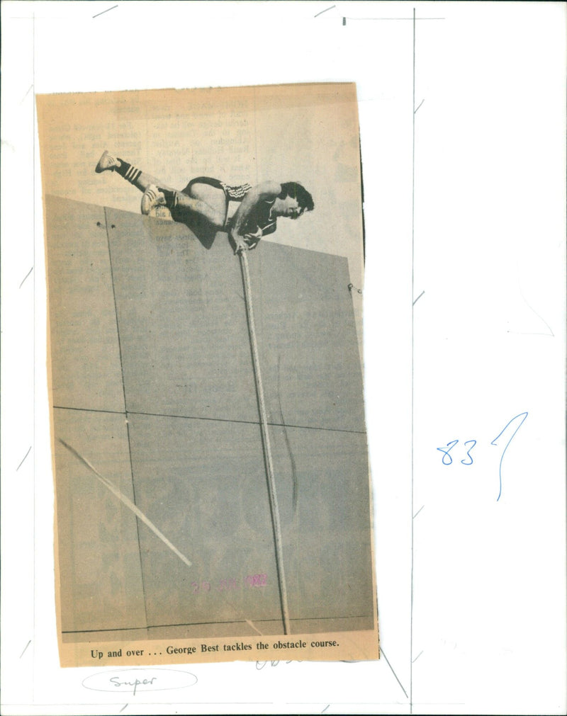 George Best competes in an obstacle course. - Vintage Photograph