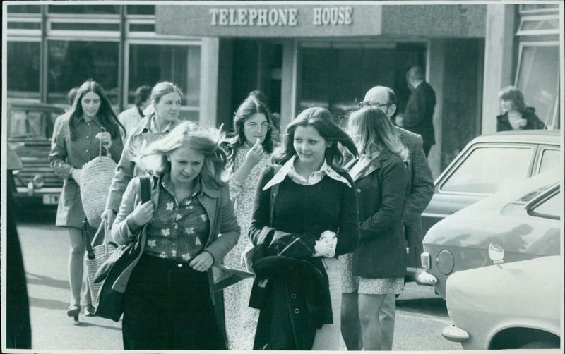 Employees of Telephone House leave the premises. - Vintage Photograph