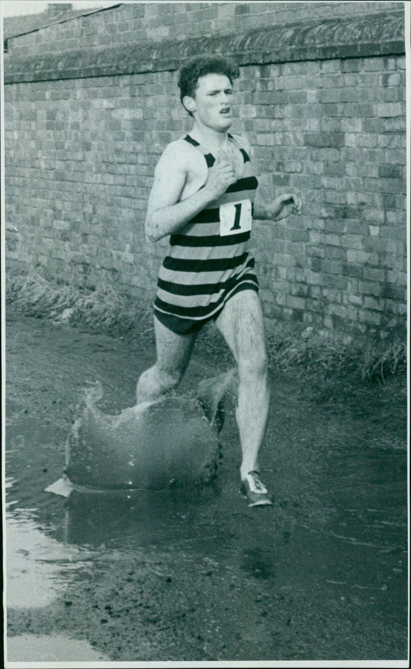 J.A. Keating competes in the Oxford Mail University Road Relay Race at Iffley Road. - Vintage Photograph