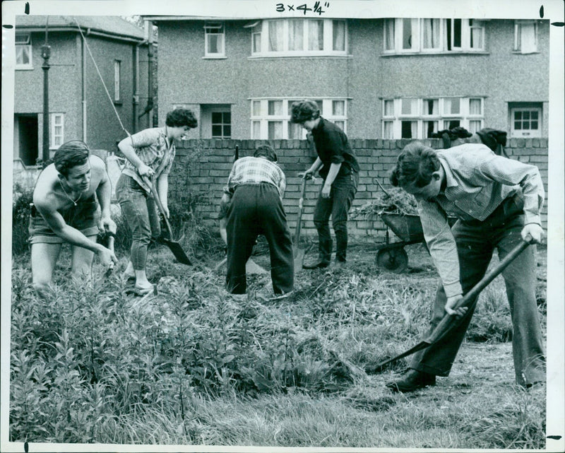 Altura undergraduates clear waste from the Risinghurst Community Centre to make way for a car park. - Vintage Photograph