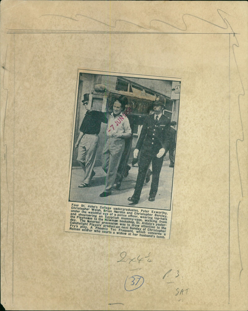 Four St. John's College undergraduates march with an Egyptian mummy-case in Oxford. - Vintage Photograph