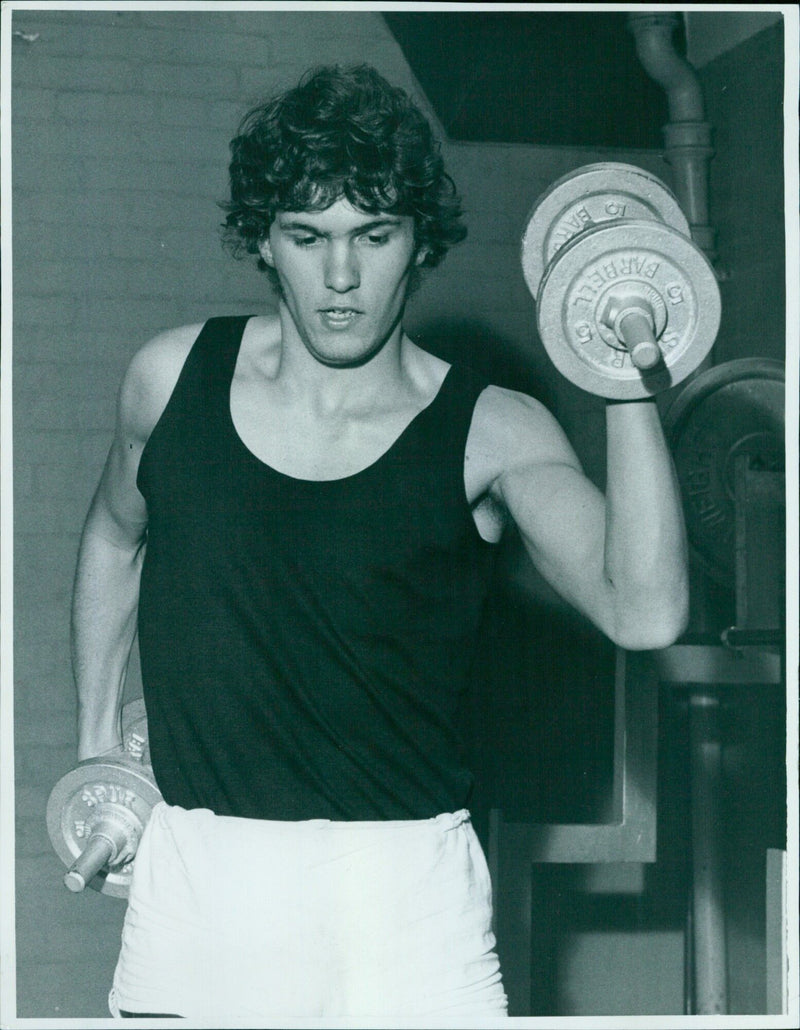 Stephen White of Wadham College weightlifting at the Oxford University Athletic Club. - Vintage Photograph