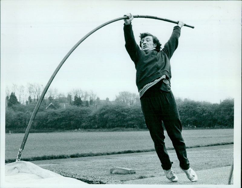 Professional skateboarder Copin Heath performs an O.4 trick at a skatepark. - Vintage Photograph