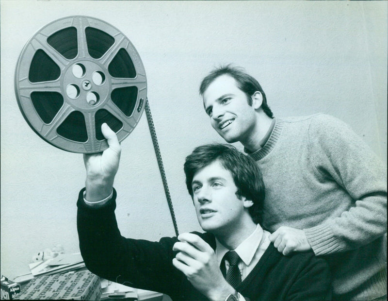 Rick Stevenson (left) and Mike Hoffman (right) look at the film they produced on a shoestring budget during post-production at Twickenham Film Studios, London. - Vintage Photograph