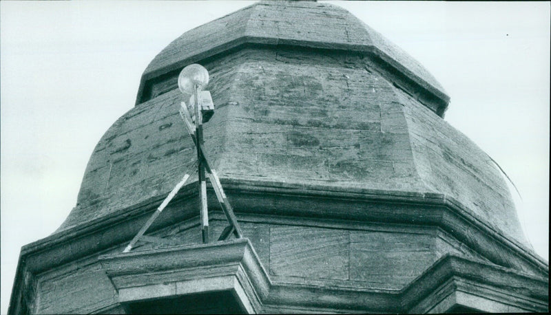 A parking lamp is seen atop the Indian Institute in Oxford. - Vintage Photograph