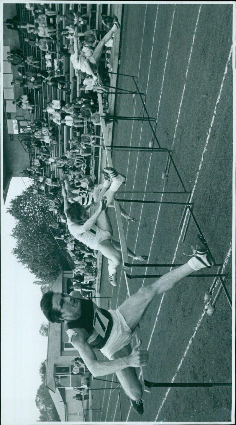 J. Connor on his way to winning the 110m Hurdles 'A' at Iffley Road. - Vintage Photograph