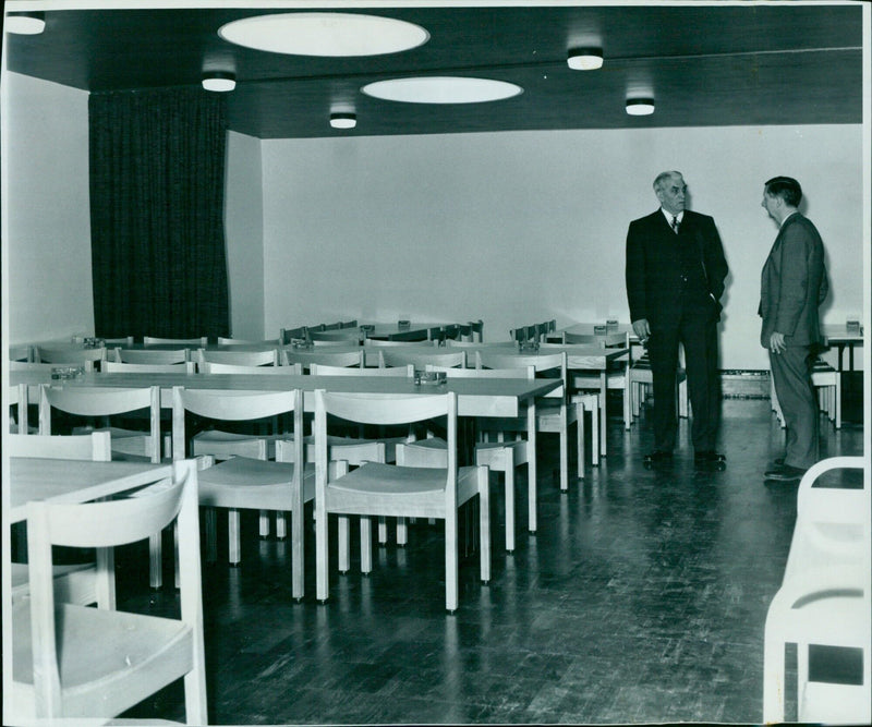 Residents of the Extra Mural Studies I Residential Centre enjoy a meal at a dining stall. - Vintage Photograph