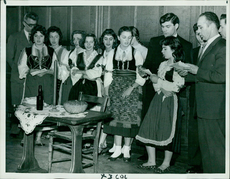 Folk dancers and singers perform at a St. Sava's Day celebration at Manchester College. - Vintage Photograph