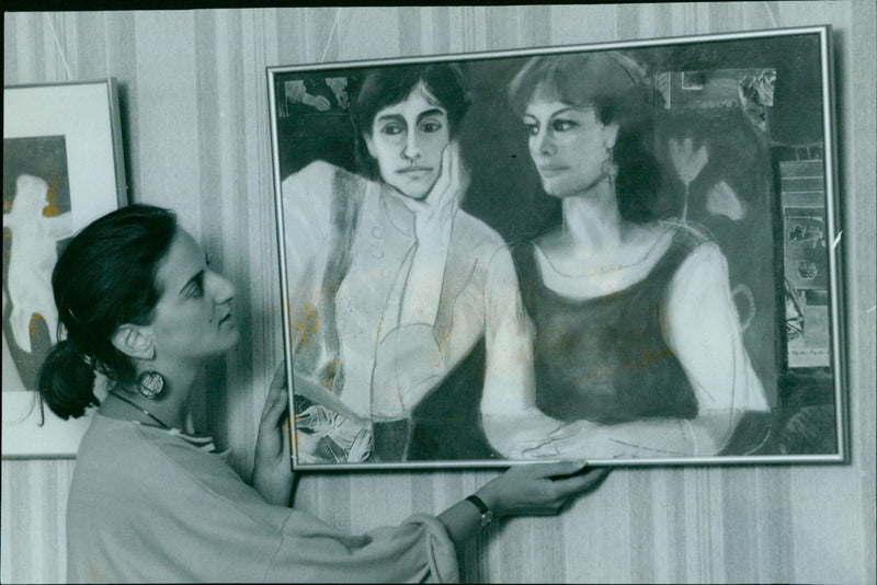 Two friends view artwork from the "Women Artists" exhibition at St. Hilda's College in Oxford, UK. - Vintage Photograph