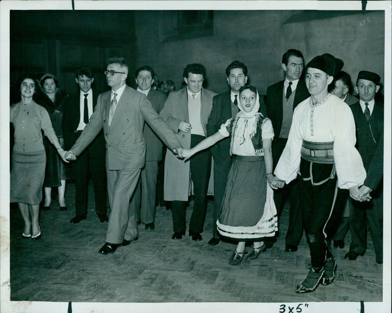 Members and friends of the Serbian Club Njegosh joining in a Kolo dance in Oxford. - Vintage Photograph