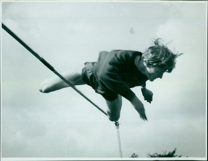 Athletes running in a race. - Vintage Photograph