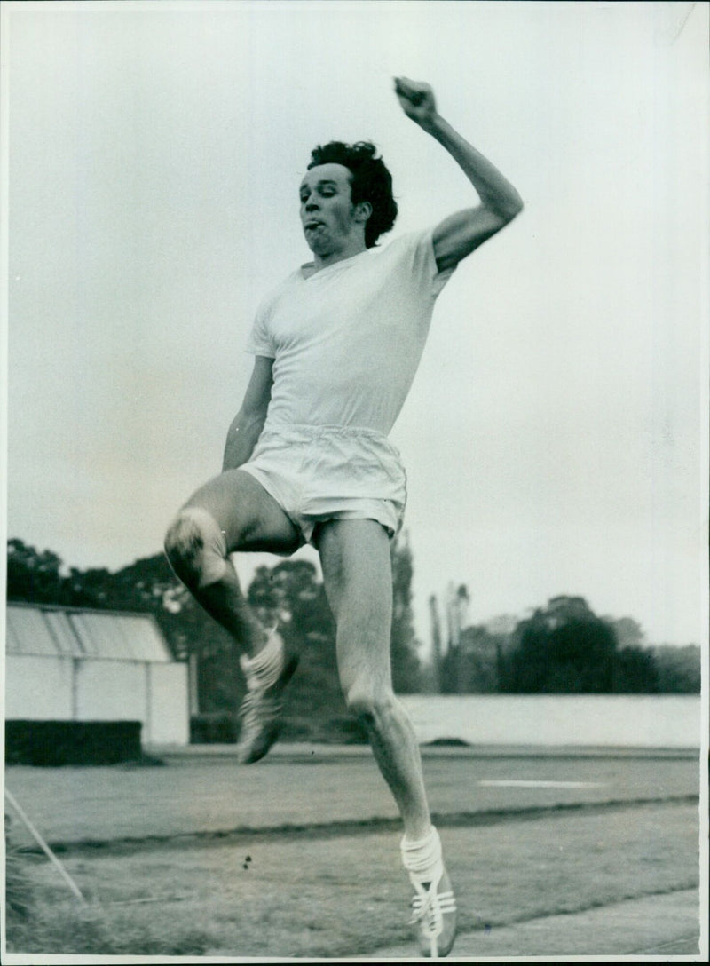 Oxford Mail athlete jumping the freshman's hurdle at 8 feet 11 inches. - Vintage Photograph