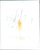 A man in a suit holds a large pill in his hands. - Vintage Photograph