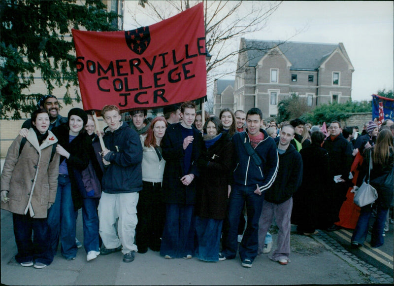 Students from Merville College, Oxford University, take part in a protest march against fees on March 2, 2001. - Vintage Photograph