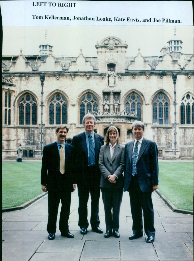 Four professionals discuss the latest legal developments in a university lecture hall. - Vintage Photograph