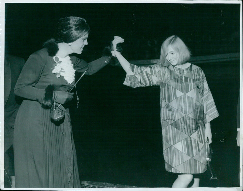 Lady Keble assists Deb Miranda Seymour into a punt in Oxford. - Vintage Photograph