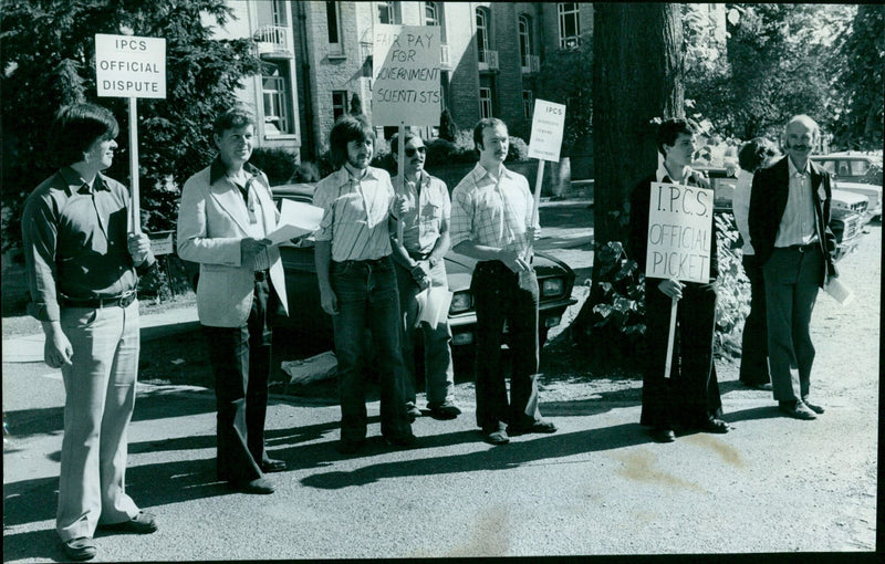 Scientists and engineers from various research centers in Oxfordshire take part in a one-day strike to protest pay. - Vintage Photograph